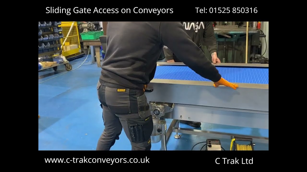 Sliding Access Gate on Conveyor Line at C Trak Ltd