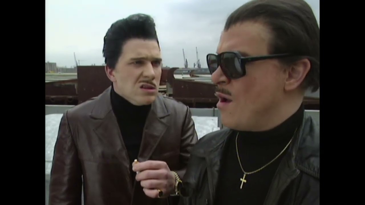 Rembo & Rembo -  Beveiligde auto (The Garlic Brothers)