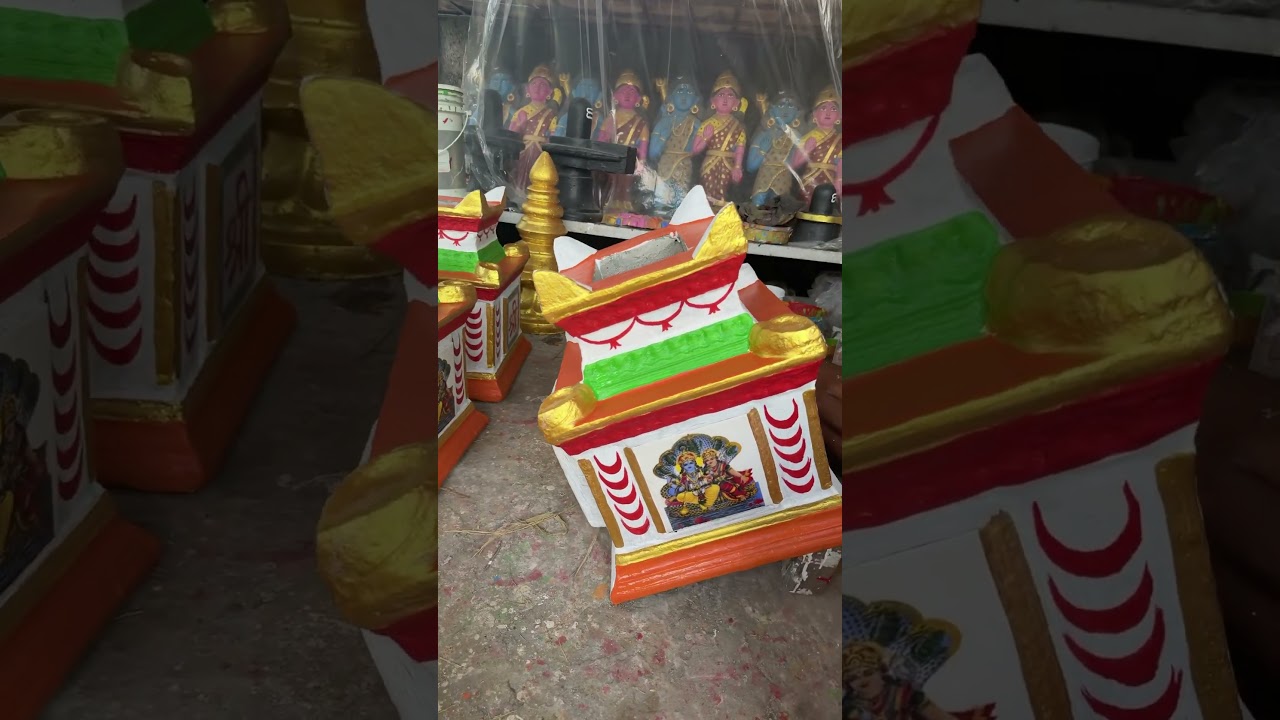 Painting a traditional Tulsi shrine made from marble powder and cement