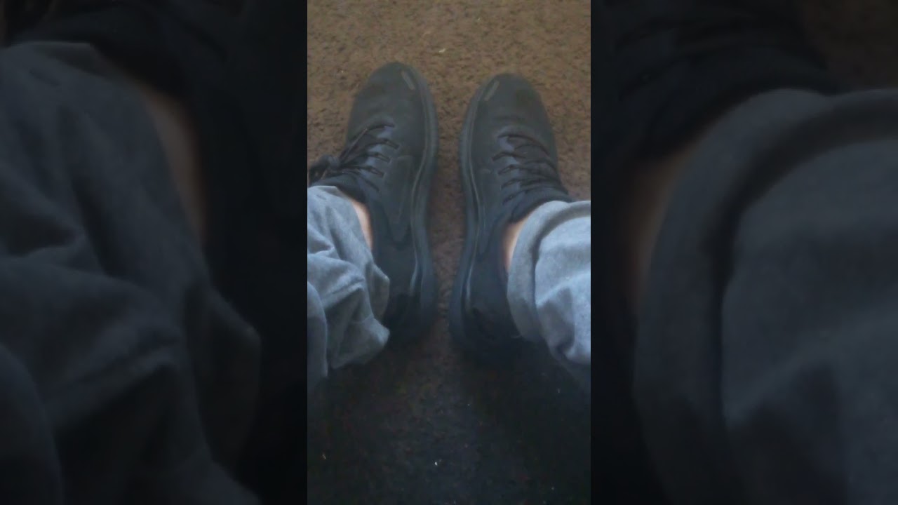 Female best friend wearing her black Nike sneakers without socks. Her POV #1.
