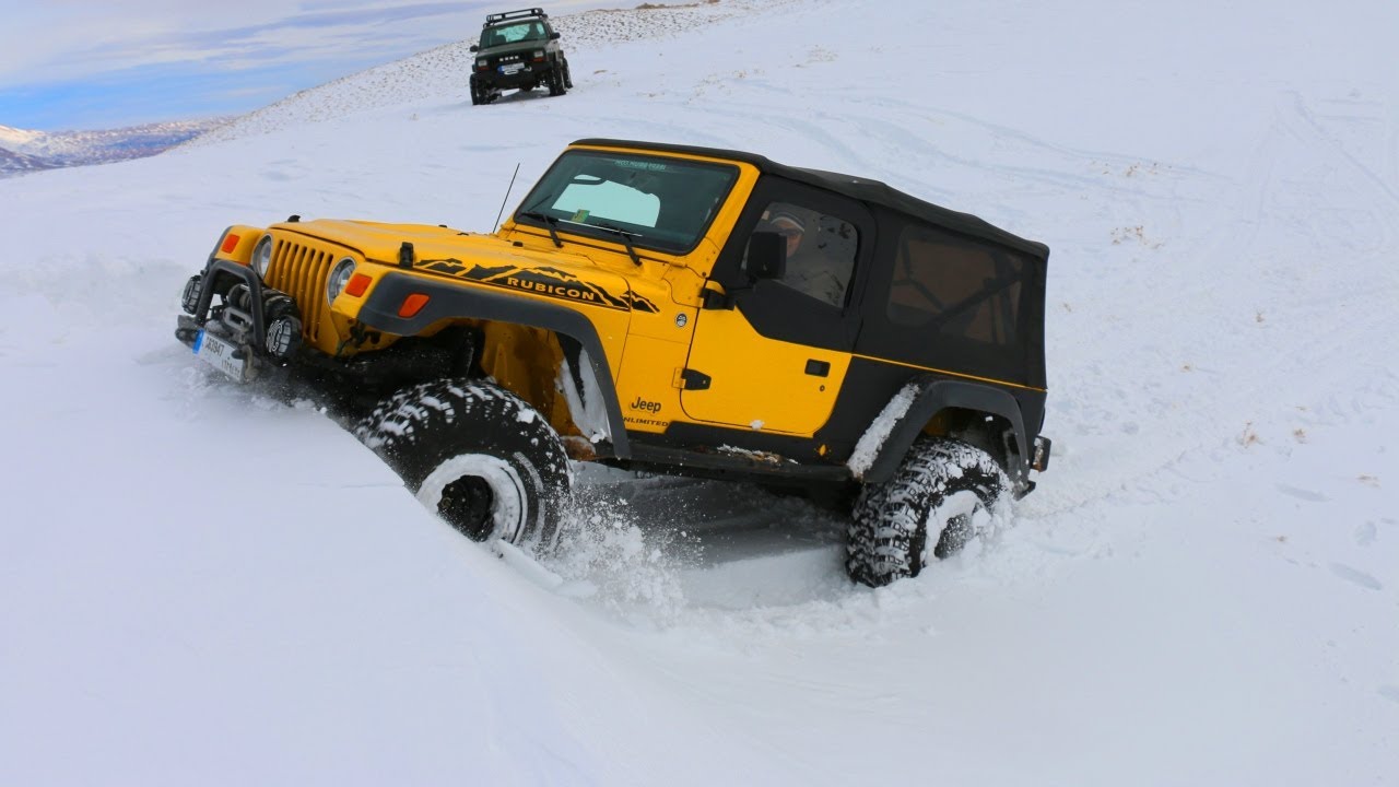 Jeep Gang Wheeling in deep powder snow
