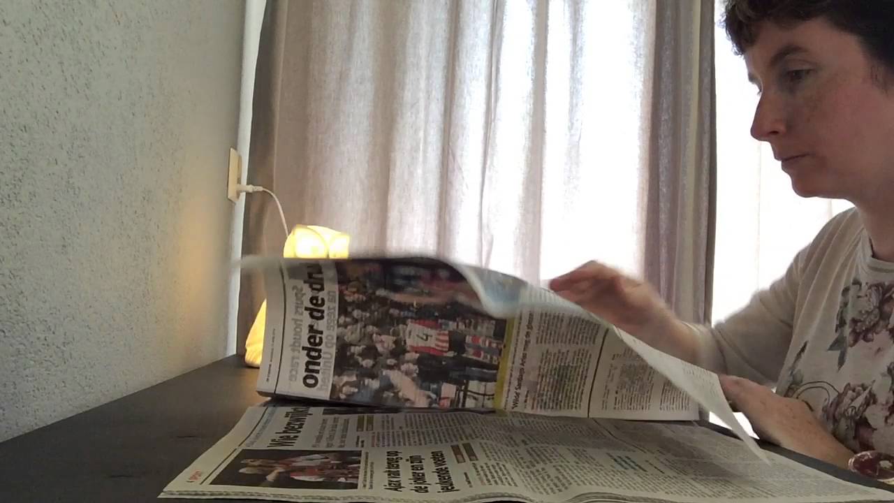 ASMR slow page turning newspapers