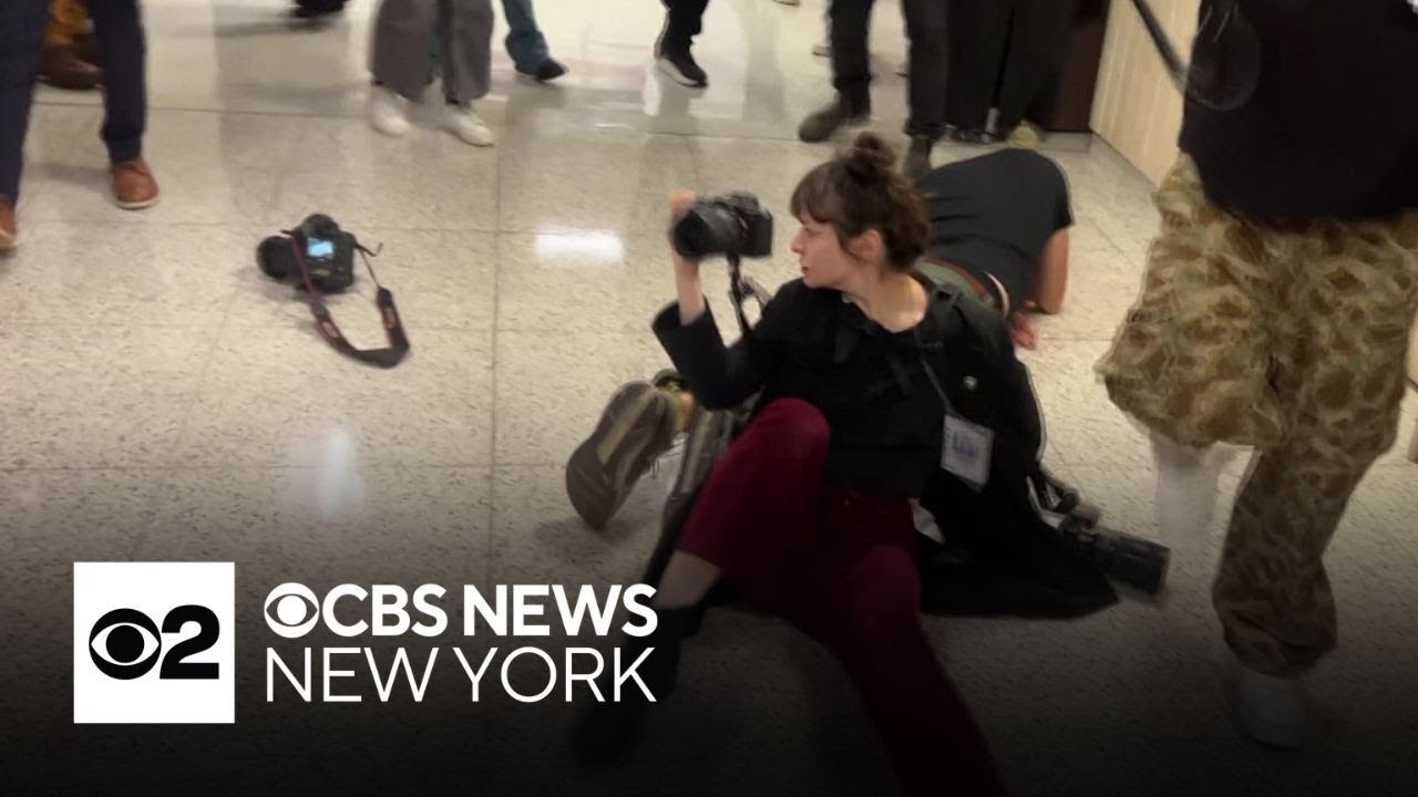 Photographer speaks out after being shoved by ICE agents outside NYC immigration court