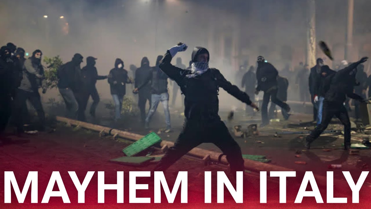 Italy rocked by chaotic scenes as rioters clash with police leaving over 100 officers injured