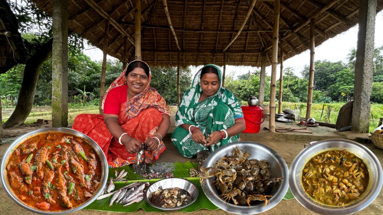 নদীর ট্যাংরা মাছের তেল ঝাল সাথে বিলের কাঁকড়া দিয়ে তেতুলের টক রান্না । Tangra macher teljal recipe