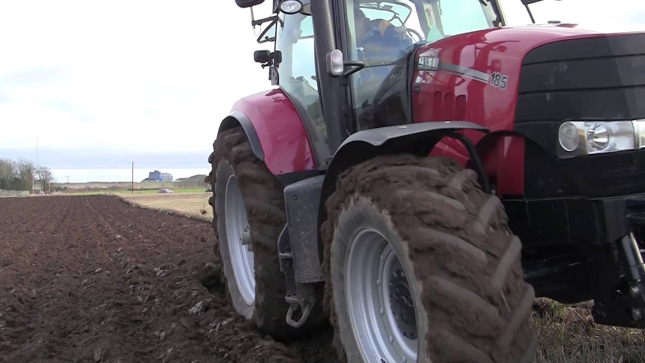 Case Puma 185 with Amazone Cayron 200, 5 furrow plough @ Crimond 2014.