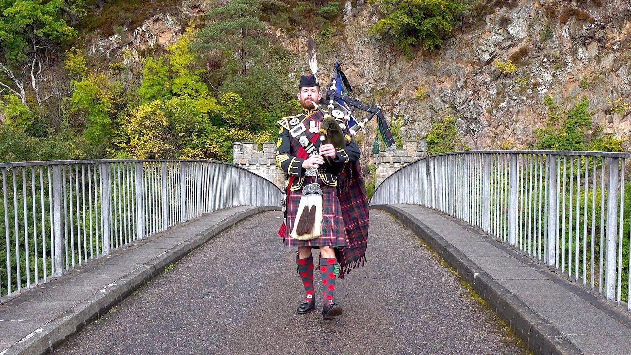 'Highlanders Day' marked by Pipe Major Grant of The Highlanders 4 SCOTS at Craigellachie Bridge