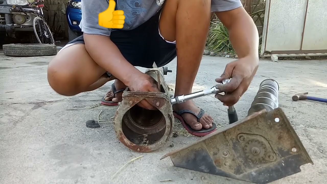 how to remove second vertical auger shaft kubota dc 70 plus