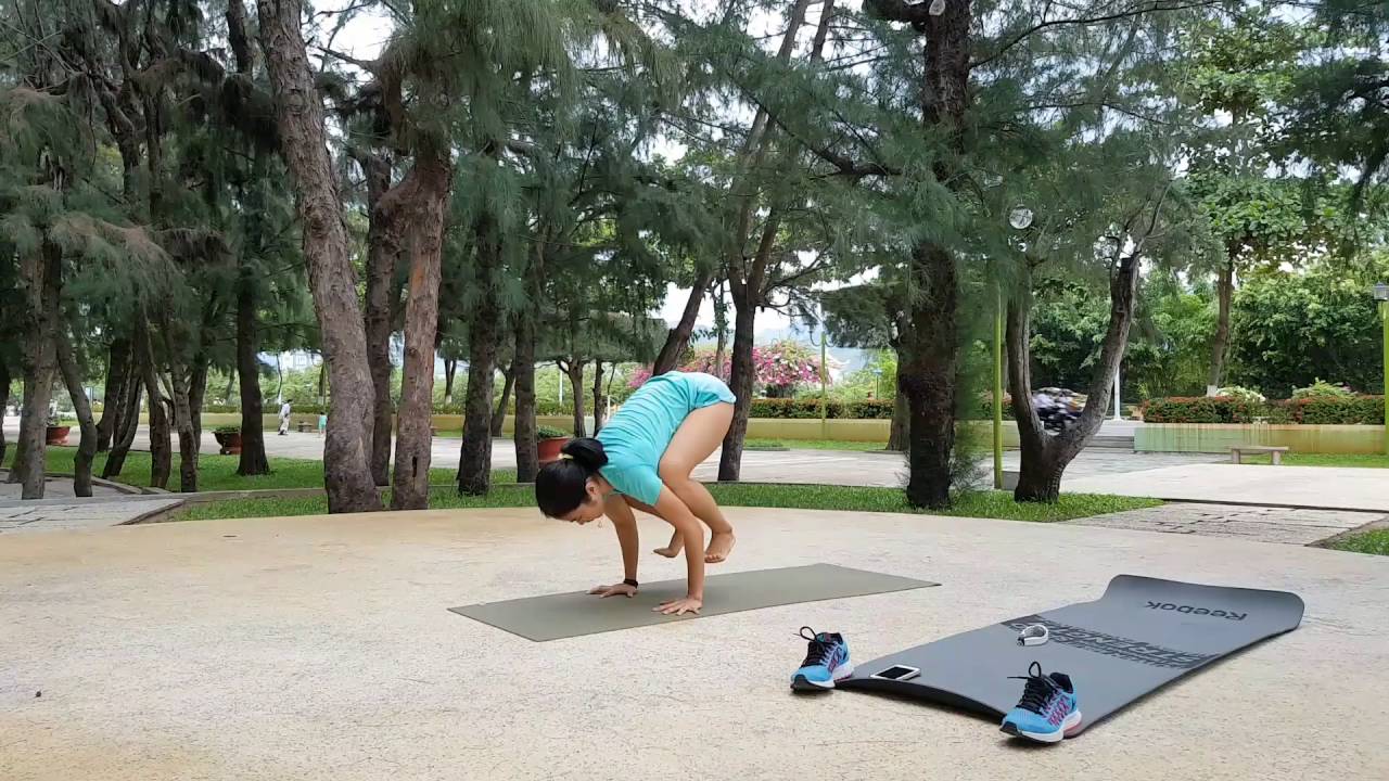 Kakasana to Adho Mukha Vrksasana by My Nguyen ( yoga Nha Trang)