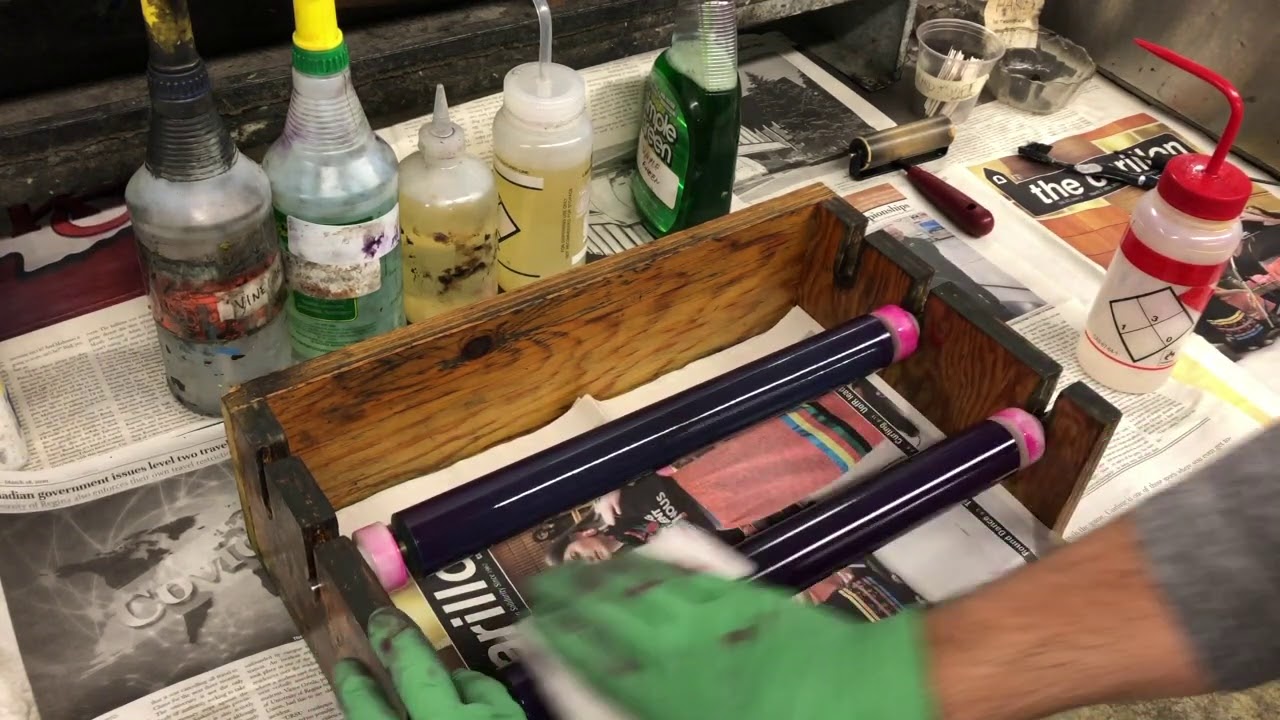 Cleaning the C&P press after printing