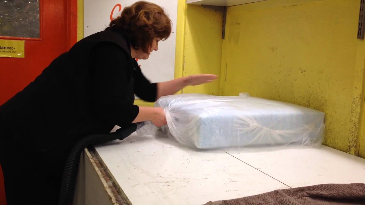 Fitting foam cushions in to covers using a vacuum