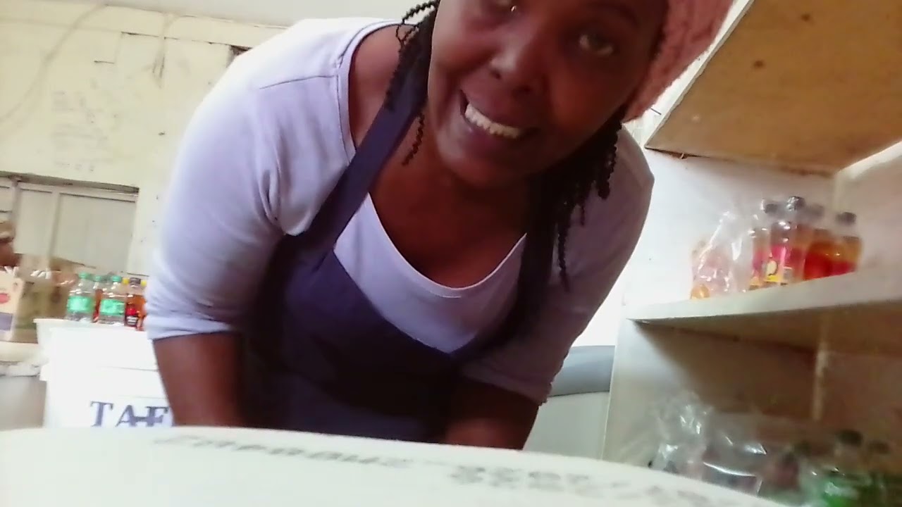 Cleaning the freezer , showing my friend how to clean it.