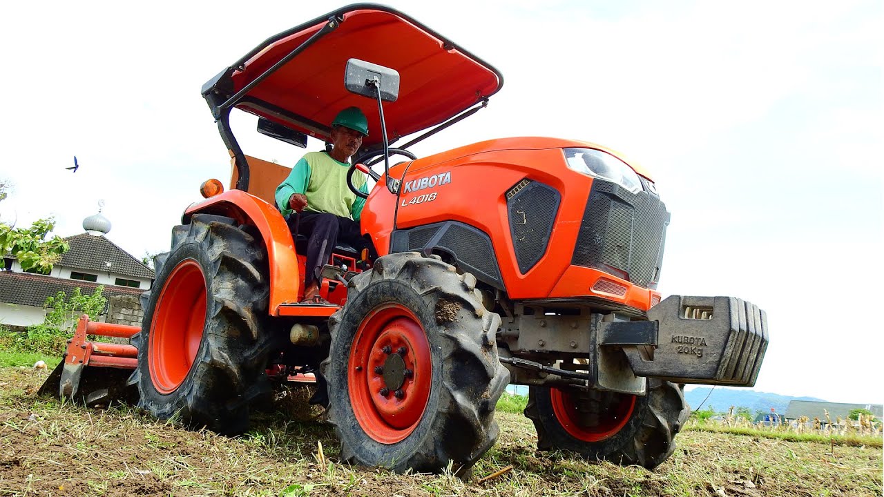 Tractor Kubota L4018 Chopping Dirt with KRX 164 Rotary Tiller