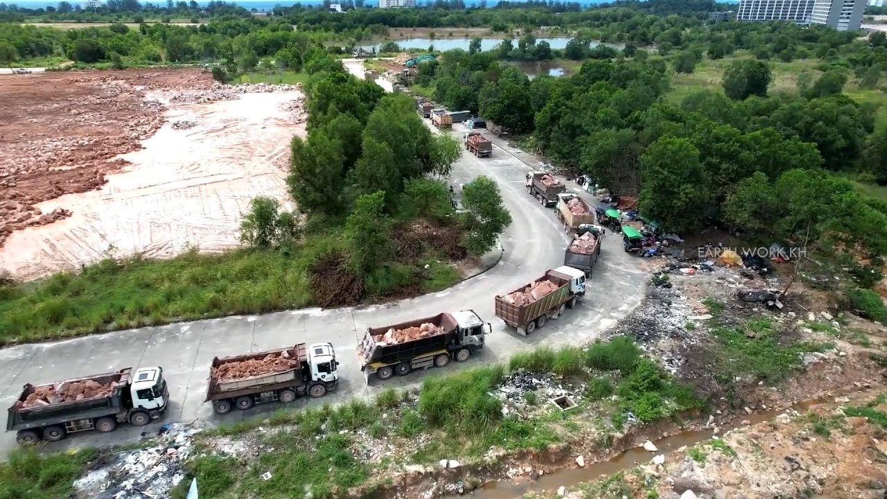 Wonderful 300 Dump Trucks Transporting Huge Stones Filling on Large Size Landfilling