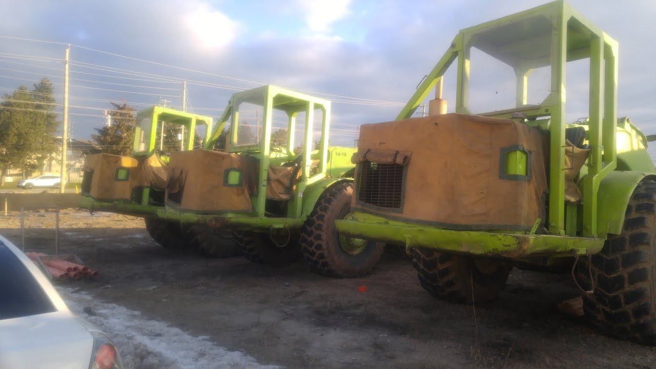 A close look at a Trio of Terex Scrapers