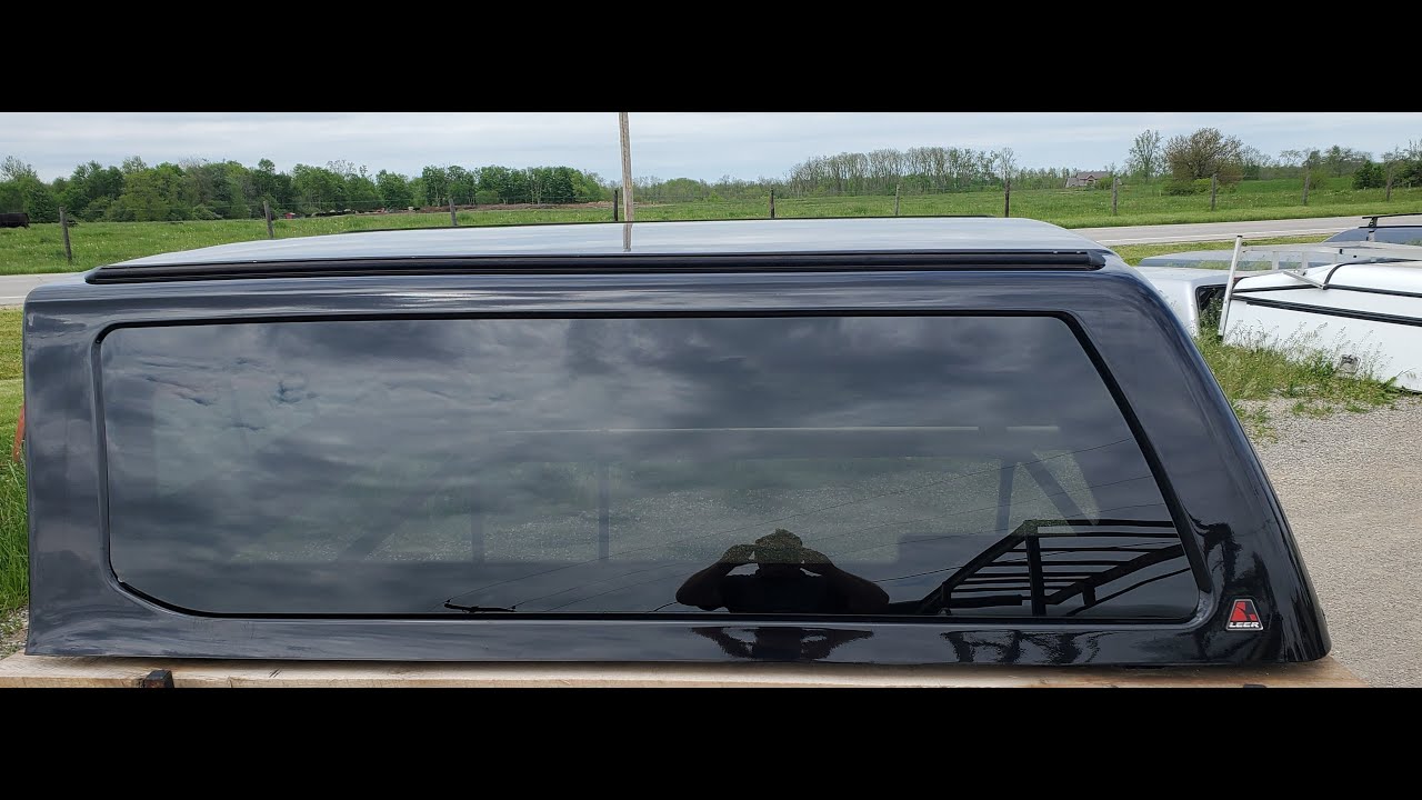 Cab high Leer Fiberglass 100XQ truck camper shell for sale. Fits 17 to 22 Ford Super Duty 6.9' bed