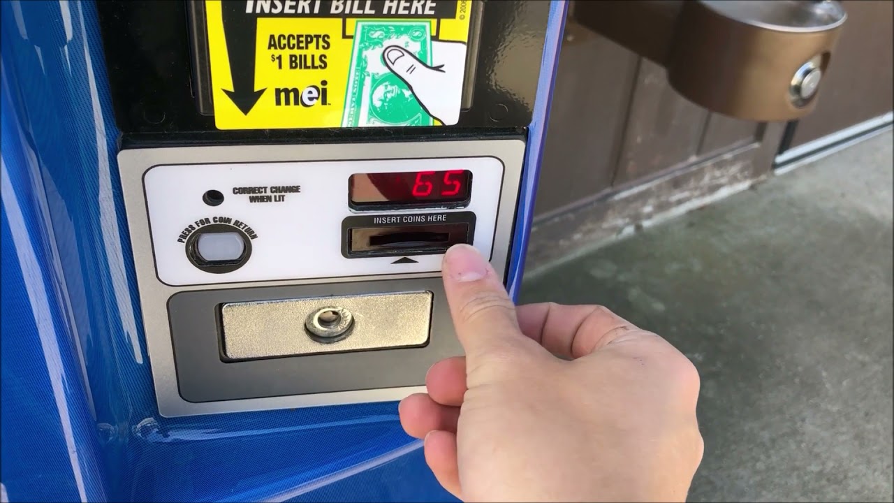Buying a Mountain Dew from a Pepsi Vending Machine