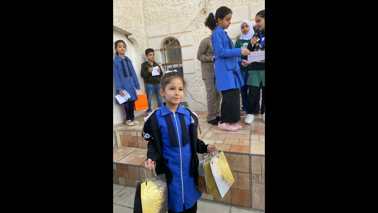 مشاركة مدرسة عائشه ام المؤمنين الاساسيه بيوم المعلم الاردني