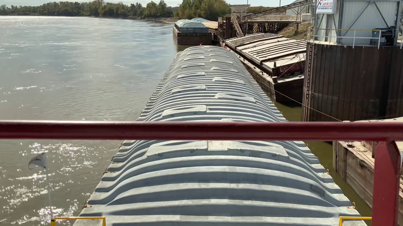 Swapping barges on a dock and putting a barge in tow