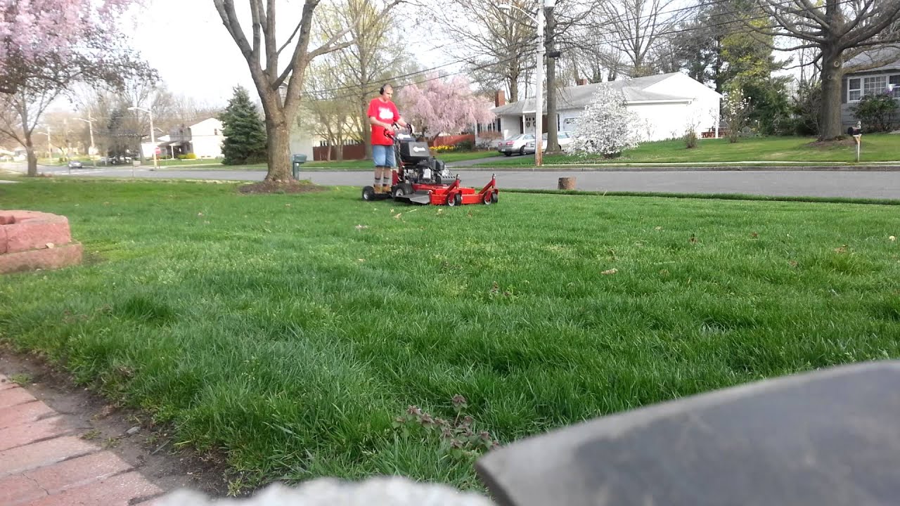 2012 Exmark metro cutting grass