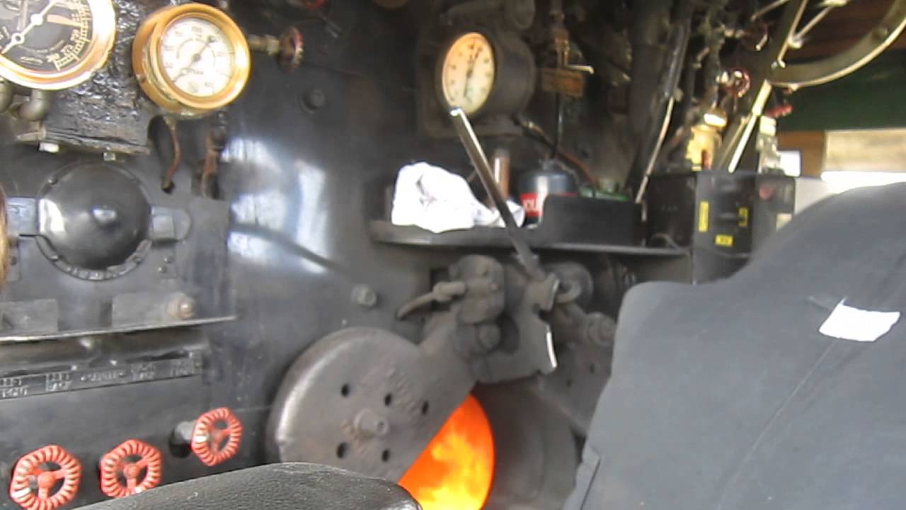 Feeding time for the 765, this is how coal is loaded into the firebox by hand