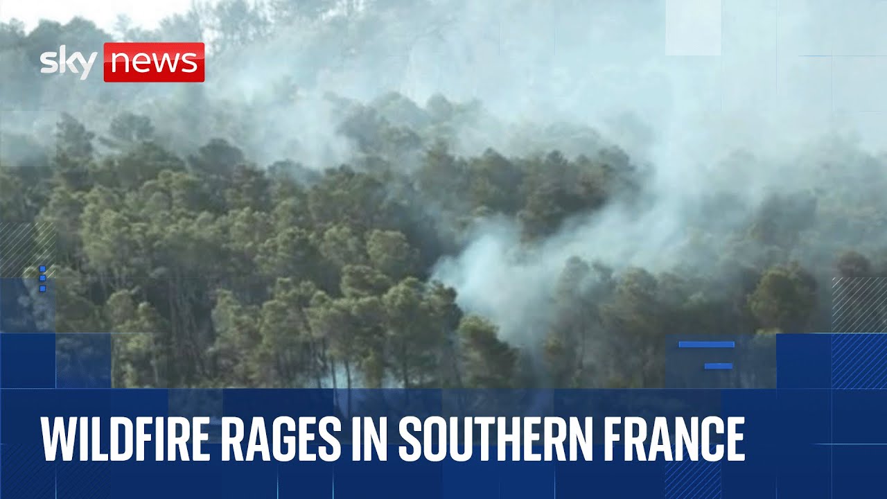 Wildfire burns in southern France forcing tourists and residents to flee