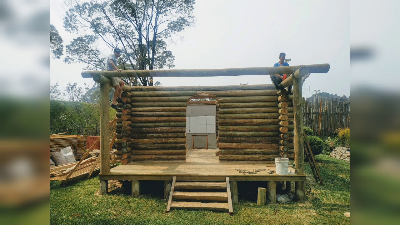Construindo minha casa de toras.