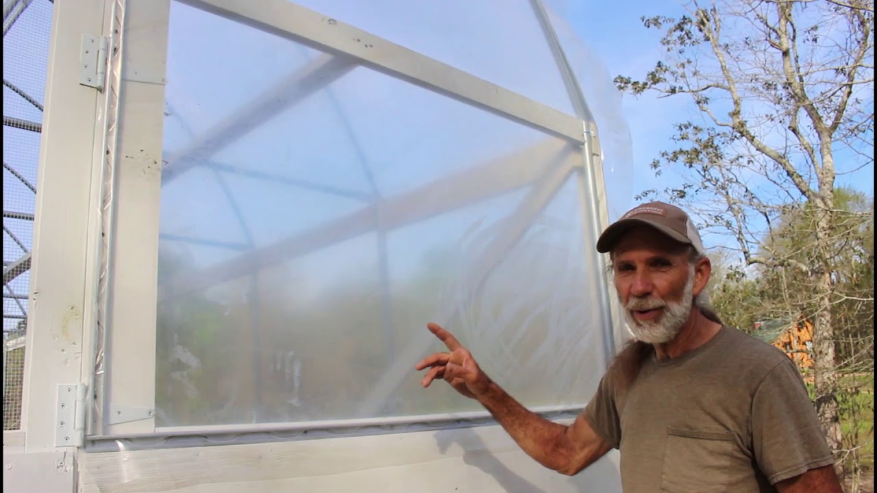 How to Build a High Tunnel/Greenhouse | Installing PLASTIC on GREENHOUSE - part 11