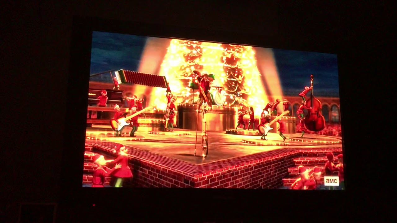 THE POLAR EXPRESS riding on top of the world and the conductor punch’s there tickets