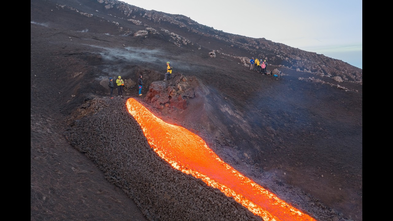 Mount Etna lava lights up Sicilian sky