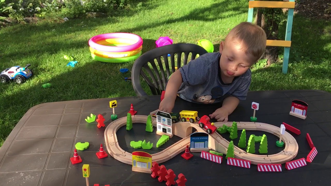 Assembling a wooden train set