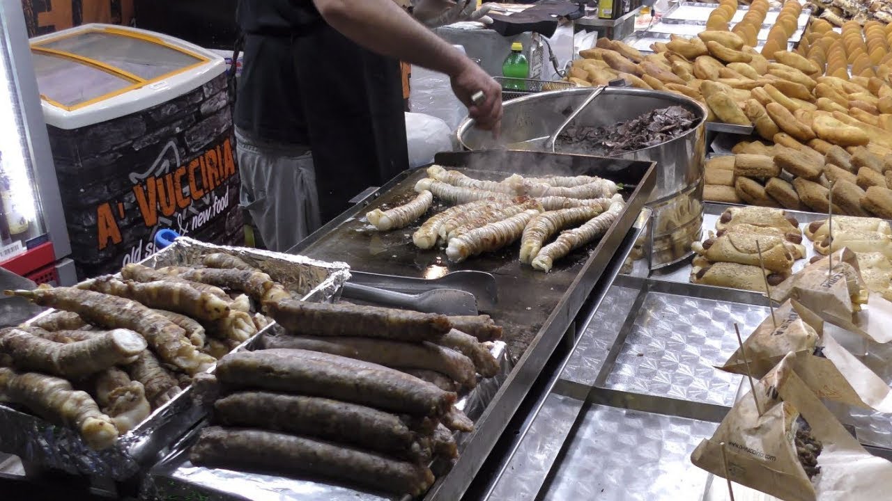Italy Street Food. Sicilian Specialities 'Stigghiola' and Chopped Veal Lung and Spleen