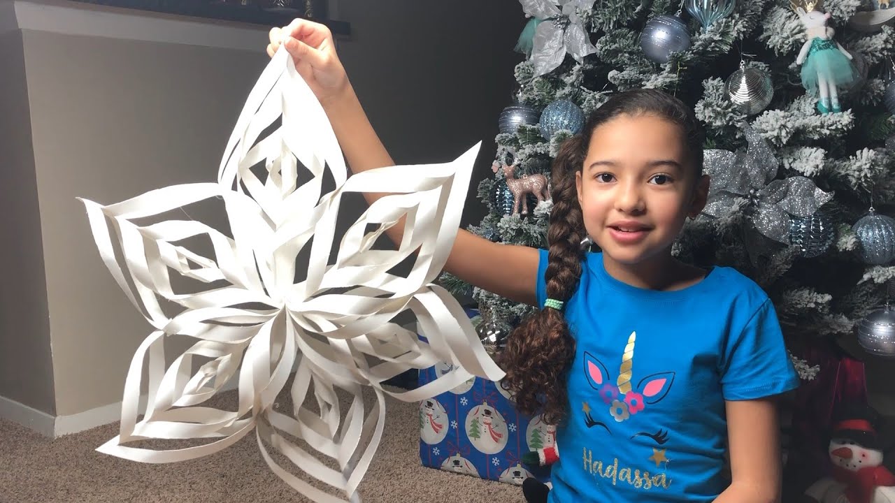 Como hacer un Copo de Nieve gigante de papel.
