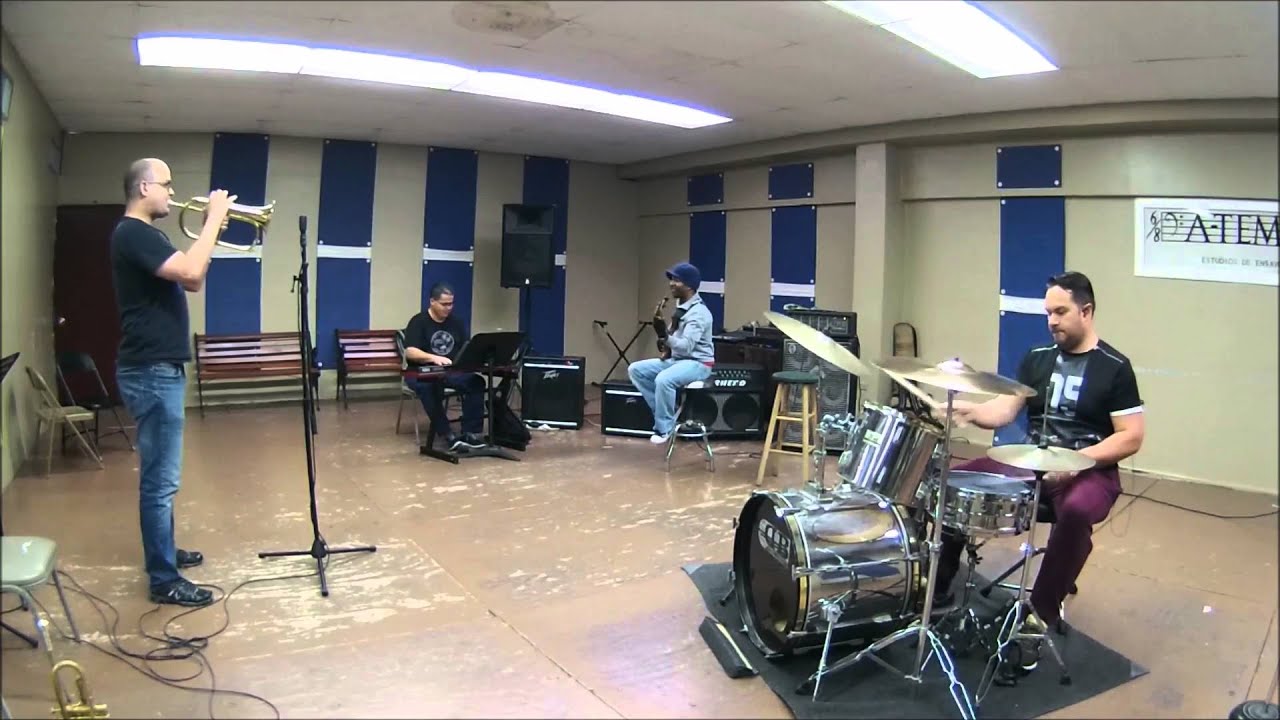 Luis Aquino Rehearsing With His Band