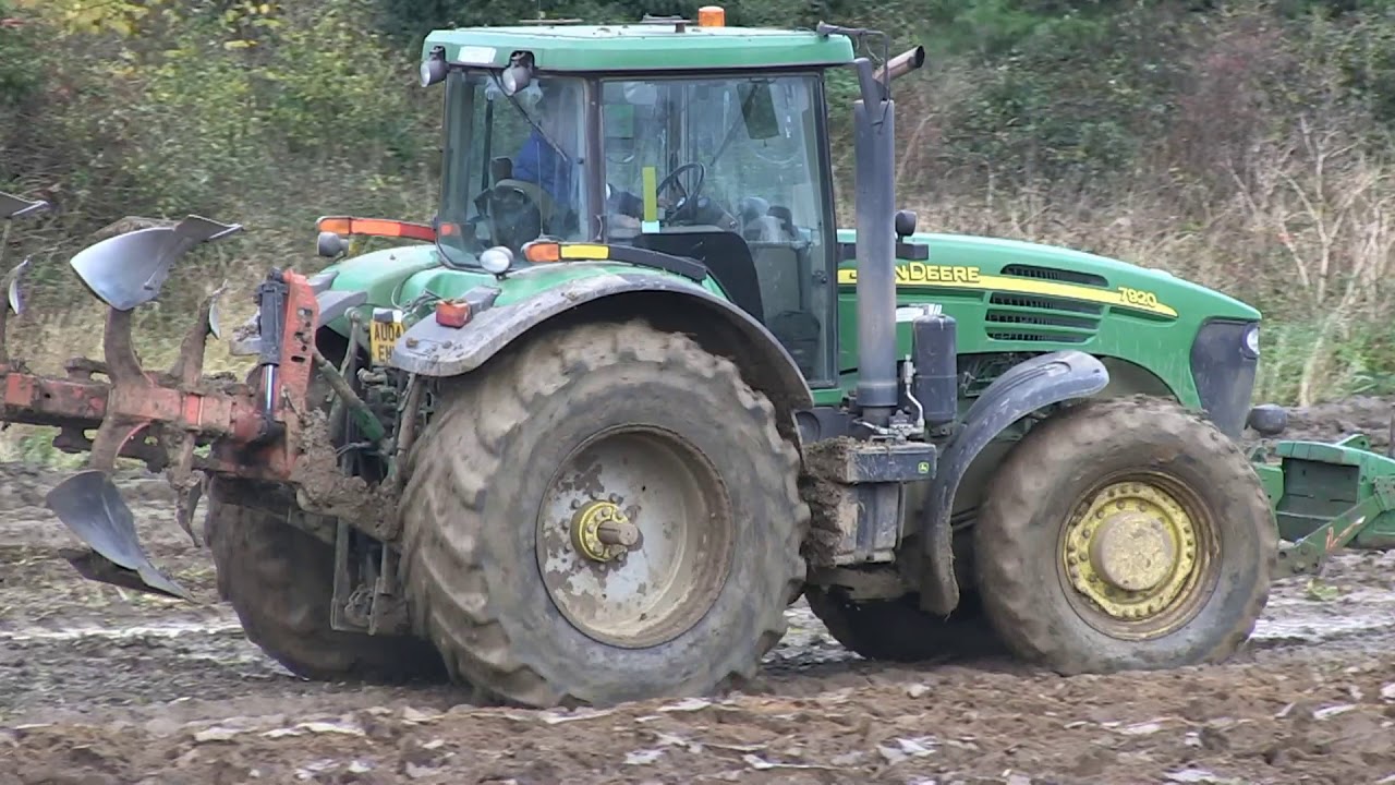 JOHN DEERE 7530 PULLING JOHN DEERE 7920 AND GREGOIRE BESSON PLOUGH
