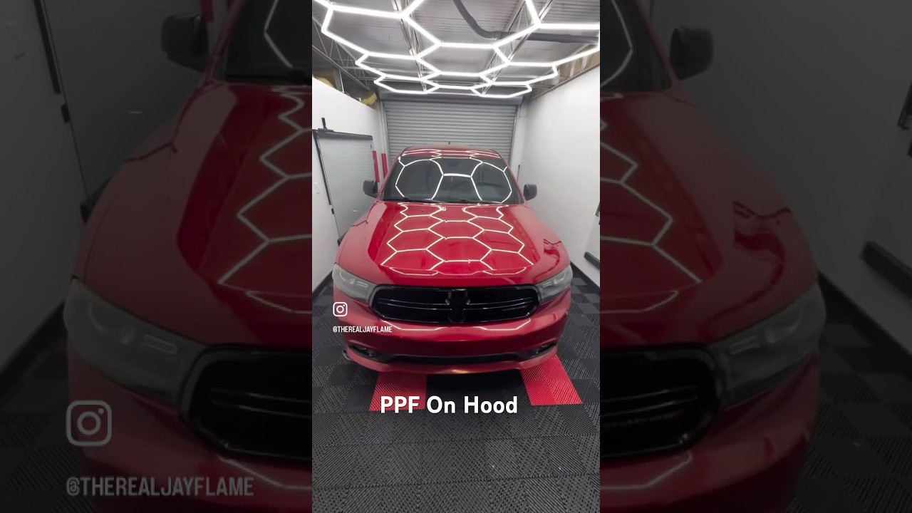 Paint Protection Film Being applied to Hood of Dodge Durango 