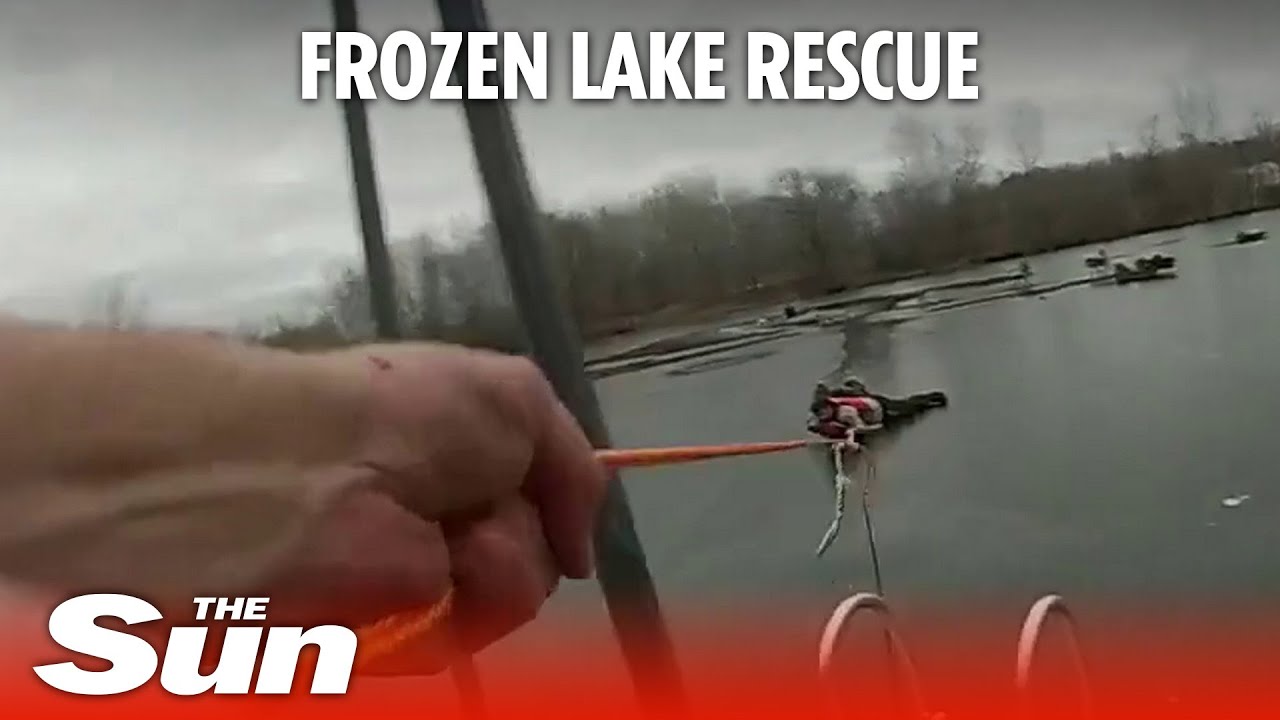 Police officer CRAWLS across frozen lake to rescue fishermen and dog