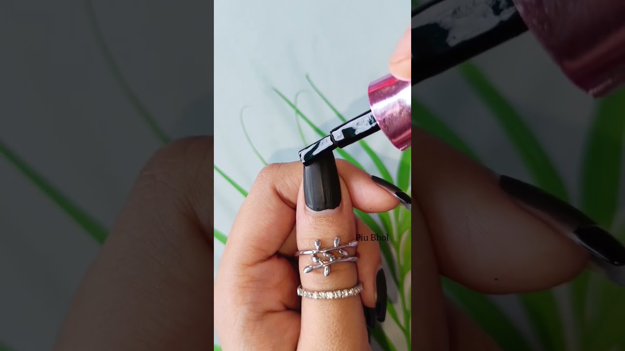Matte and glossy black Nail polish design 