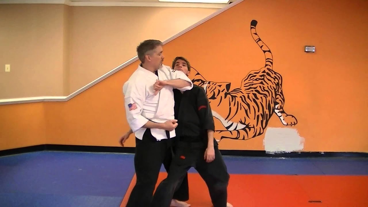 Crashing Wings - Kenpo self defense technique for a rear bear hug arms free