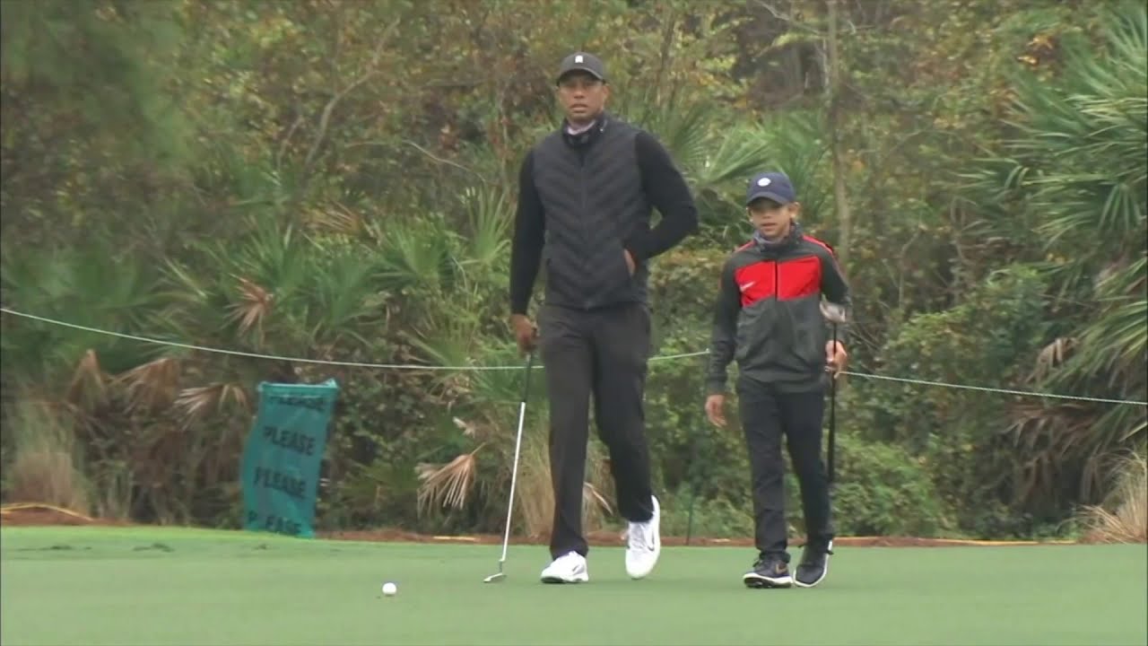 Tiger Woods Practices With His Son Charlie Ahead Of PNC Championship