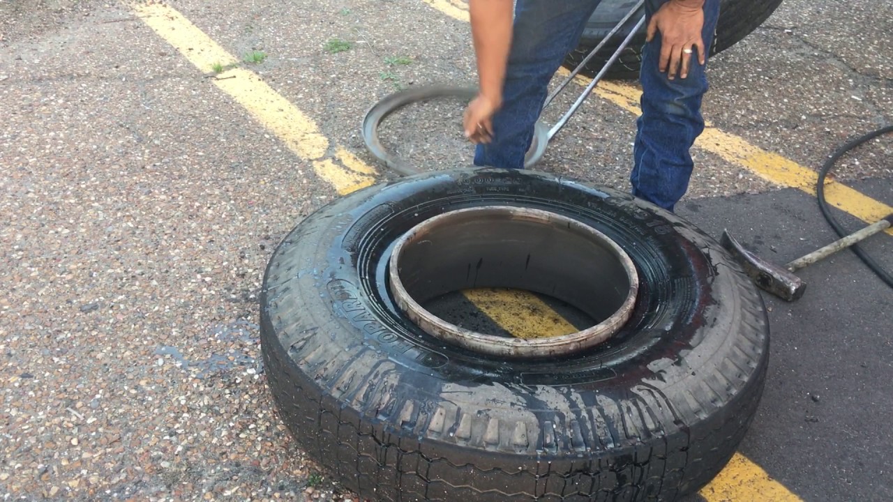 Changing out a 10.000/20 tire