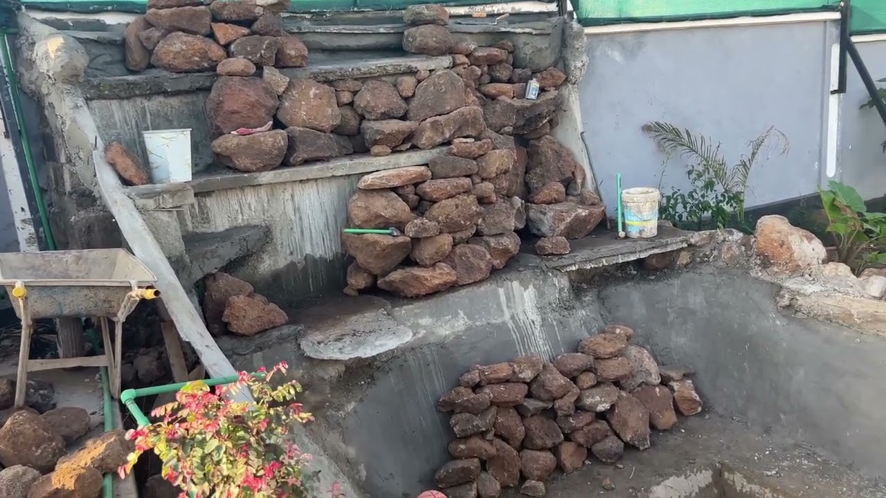 THE FINAL PART OF THE WATERFALL AS WE WAIT FOR THE PRE ORDERED WATER PUMP TO ARRIVE