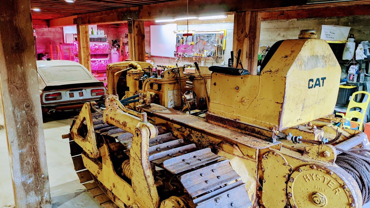 Moving a broken Caterpillar D4 into my shop without any help