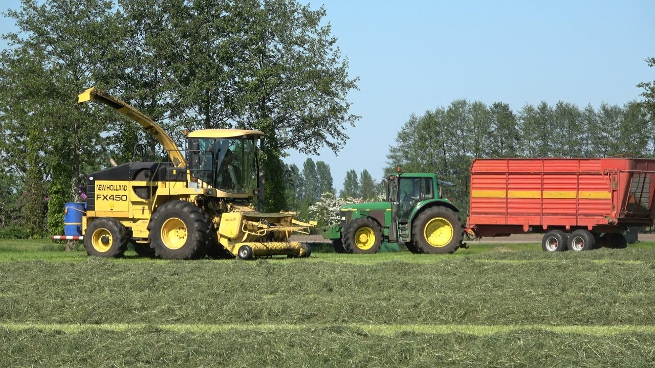 Gras hakselen en inkuilen met New Holland FX, John Deere en Ahlmann (2018)