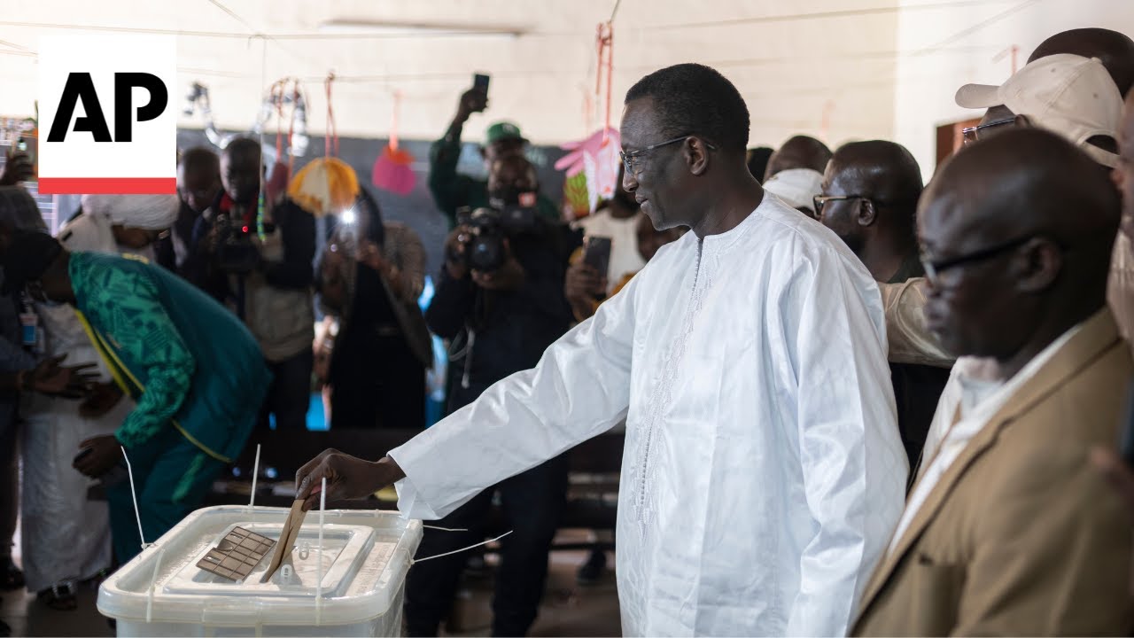 Senegal votes in tight presidential race after months of unrest