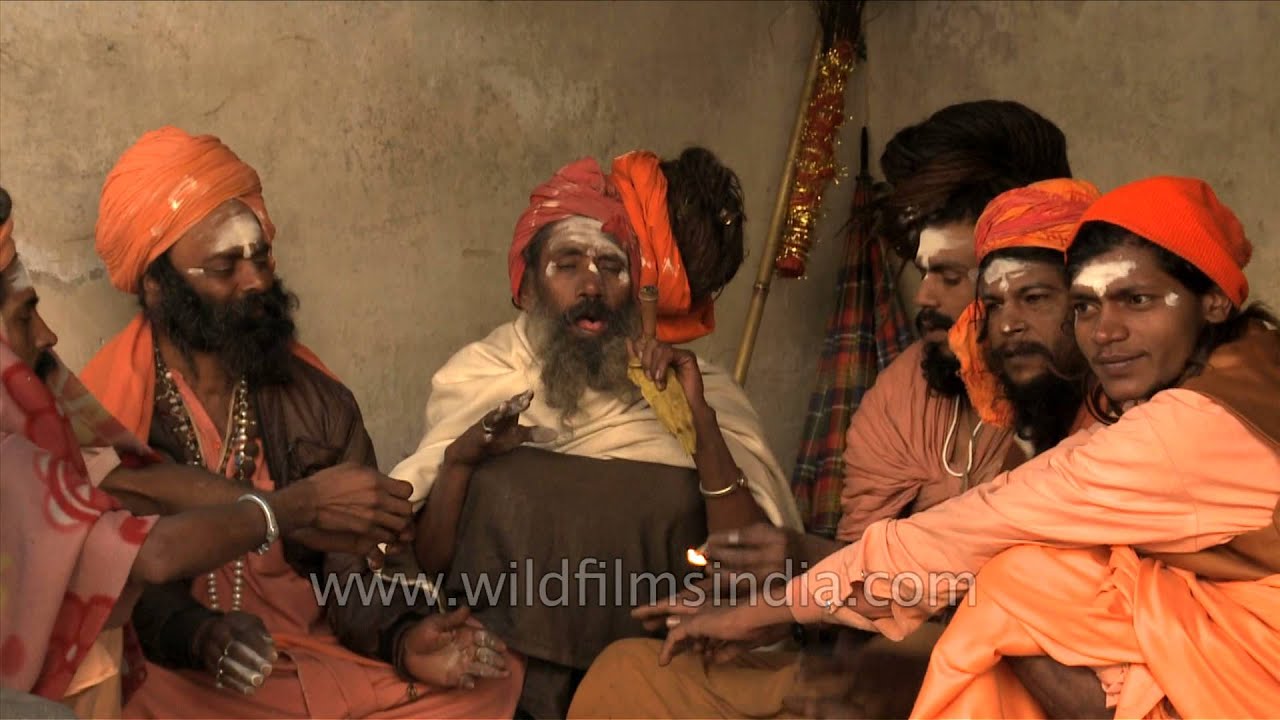 Sadhus smoke marijuana in a chillum