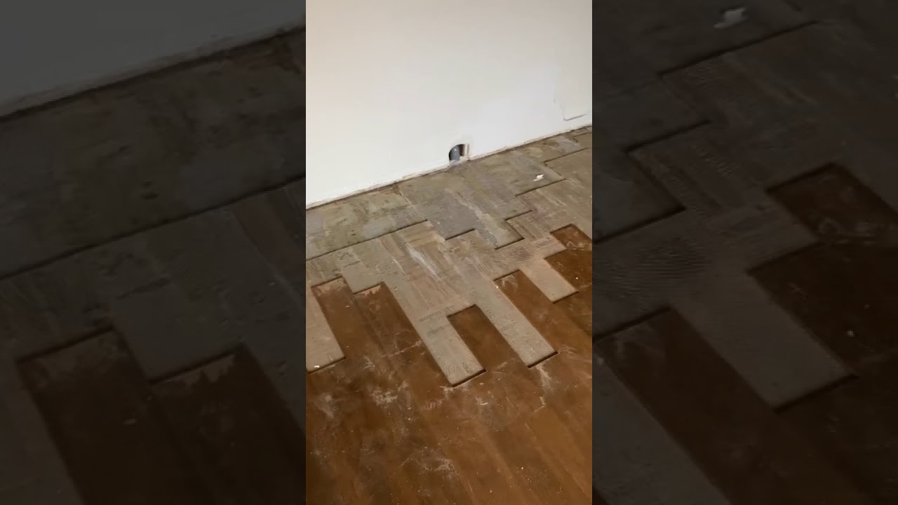 Houten vloer hersteld na waterschade