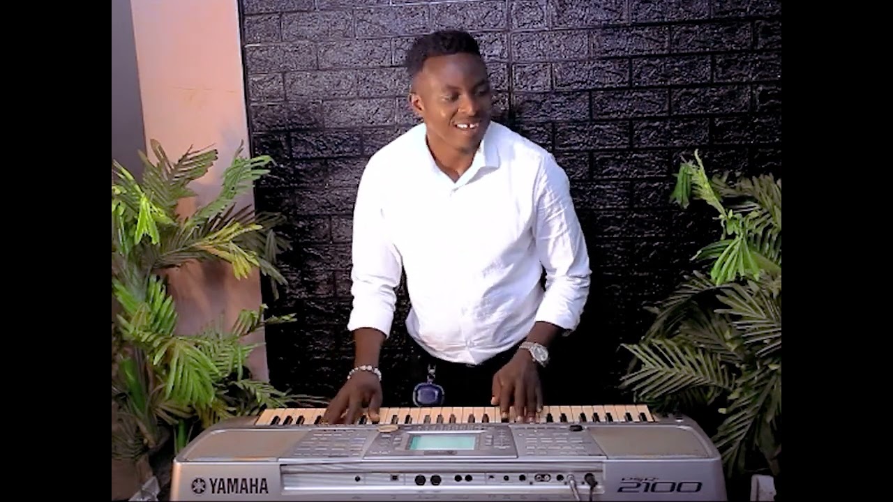 Umukunga_na_Obed_Onkeys_umucuranzi_ufite Impano_ihambaye_mundirimbo_zaririmbiwe_Imana