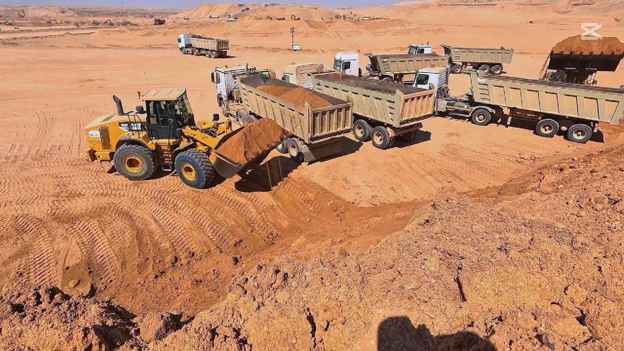 CAT Wheel Loaders Loading Trailers | Efficient Earthworks Operation by AMC