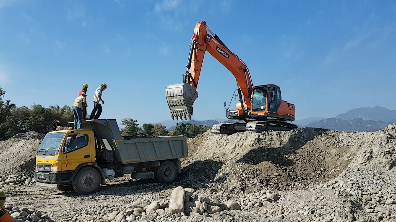 Doosan Crawler Excavator Loading Gravel In Truck